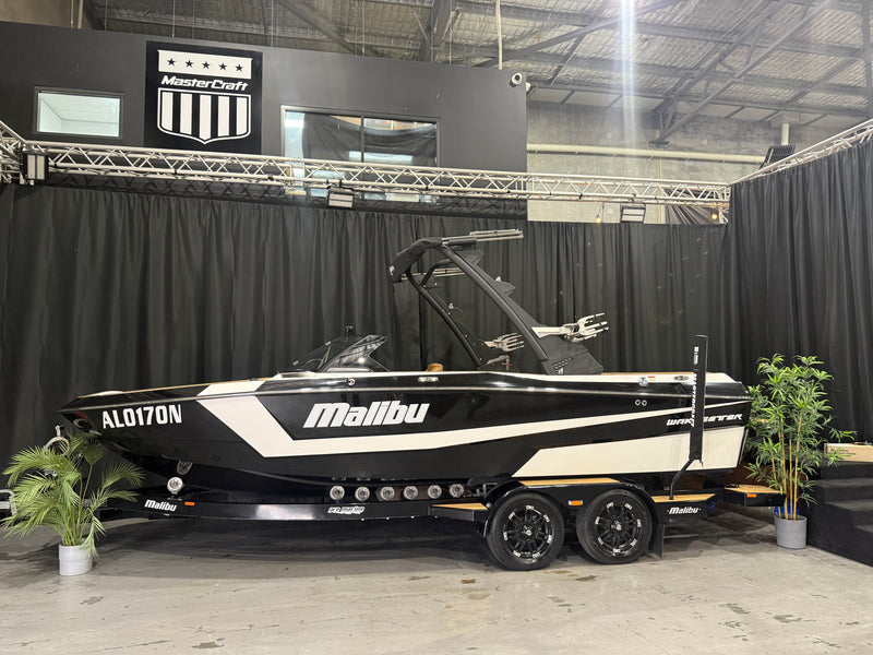 2022 Malibu 21LX — black and white side profile against black showroom backdrop